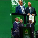 Photo of Patrick Achi along with CAF and FIFA Presidents