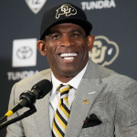 Photo of Deion Sanders in conference press after colorado win over USC