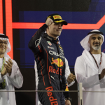 Photo of Max Verstappen along with Abu Dhabi authority.