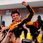 Photo of Norris pull up by his reammates after clinching Miami Grand Prix 2024 tilte over Verstappen.