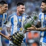 Photo of Messi along with his teammates, lifting Copa America2024 Cup.