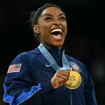 Photo of Simone Biles when secure Gold for Team USA Paris 2024 Olympics gymnastics game.