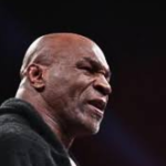 Mike Tyson is preparing for a fight, showcasing his intense focus and determination ahead of his upcoming match against Jake Paul.