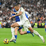 Kylian Mbappe celebrates in a Real Madrid jersey after scoring in a 2-0 win over Getafe at the Santiago Bernabeu..