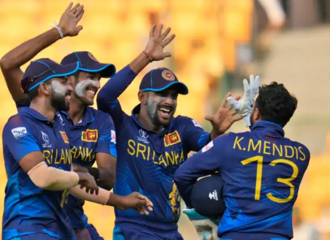 Photo of Sri Lanka team celebrating victory over England in ICC cricket world cup.