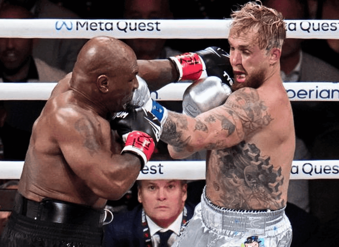 Jake Paul celebrates his victory over Mike Tyson in a controversial fight, with boos echoing from the crowd at AT&T Stadium, Arlington, Texas.