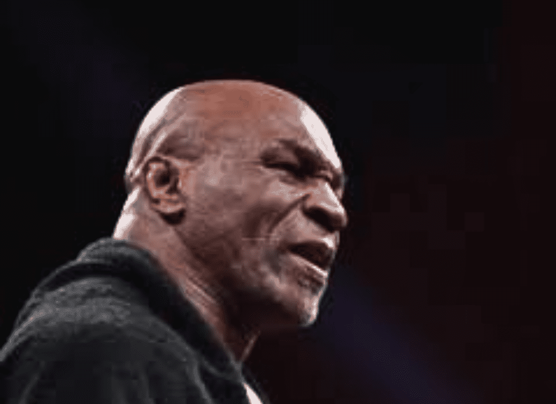 Mike Tyson is preparing for a fight, showcasing his intense focus and determination ahead of his upcoming match against Jake Paul.