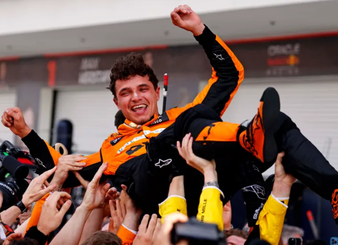 Photo of Norris pull up by his reammates after clinching Miami Grand Prix 2024 tilte over Verstappen.