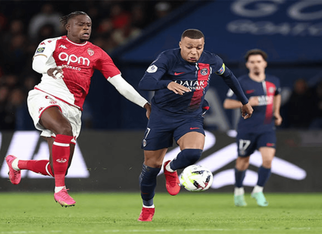 PSG's Kylian Mbappe celebrates after scoring during a dominant 5-2 victory over Monaco in a Ligue 1 match.