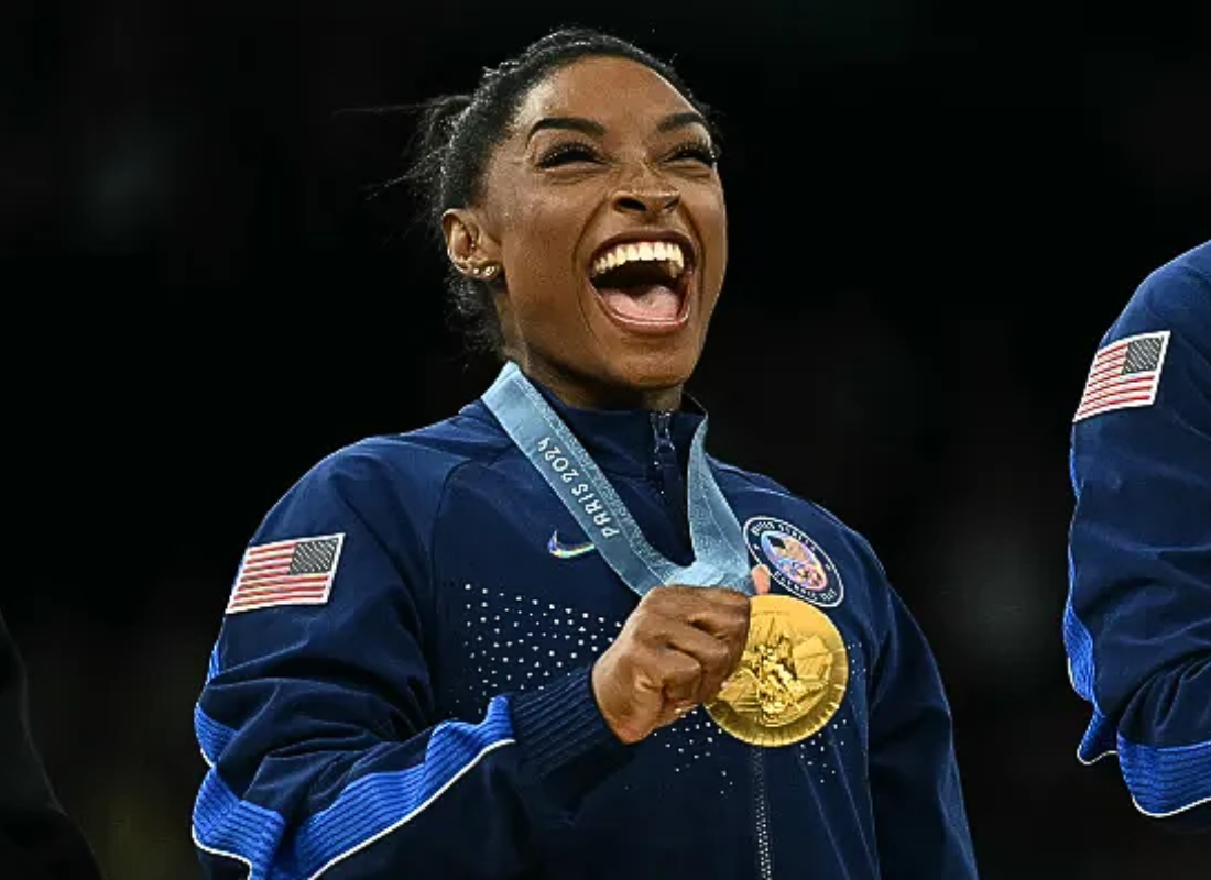 Photo of Simone Biles when secure Gold for Team USA Paris 2024 Olympics gymnastics game.